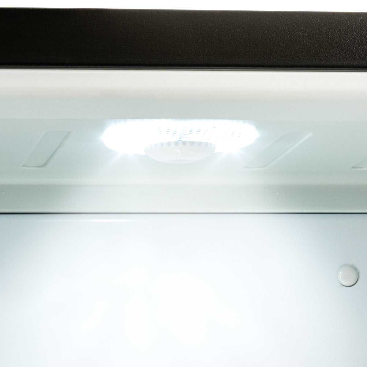 Mini bar fridge interior ceiling light with smooth white paneling