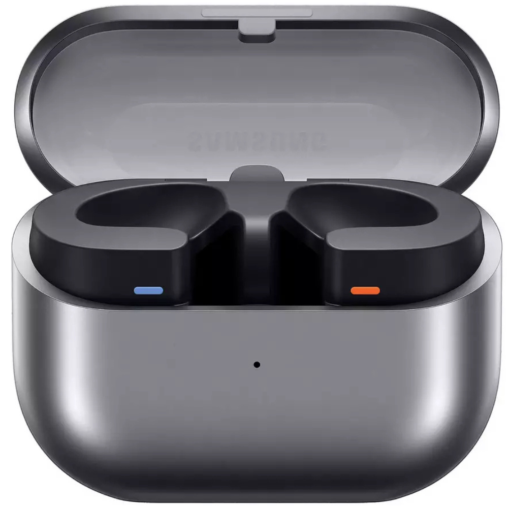 Silver wireless earbuds in open charging case with blue and orange indicators