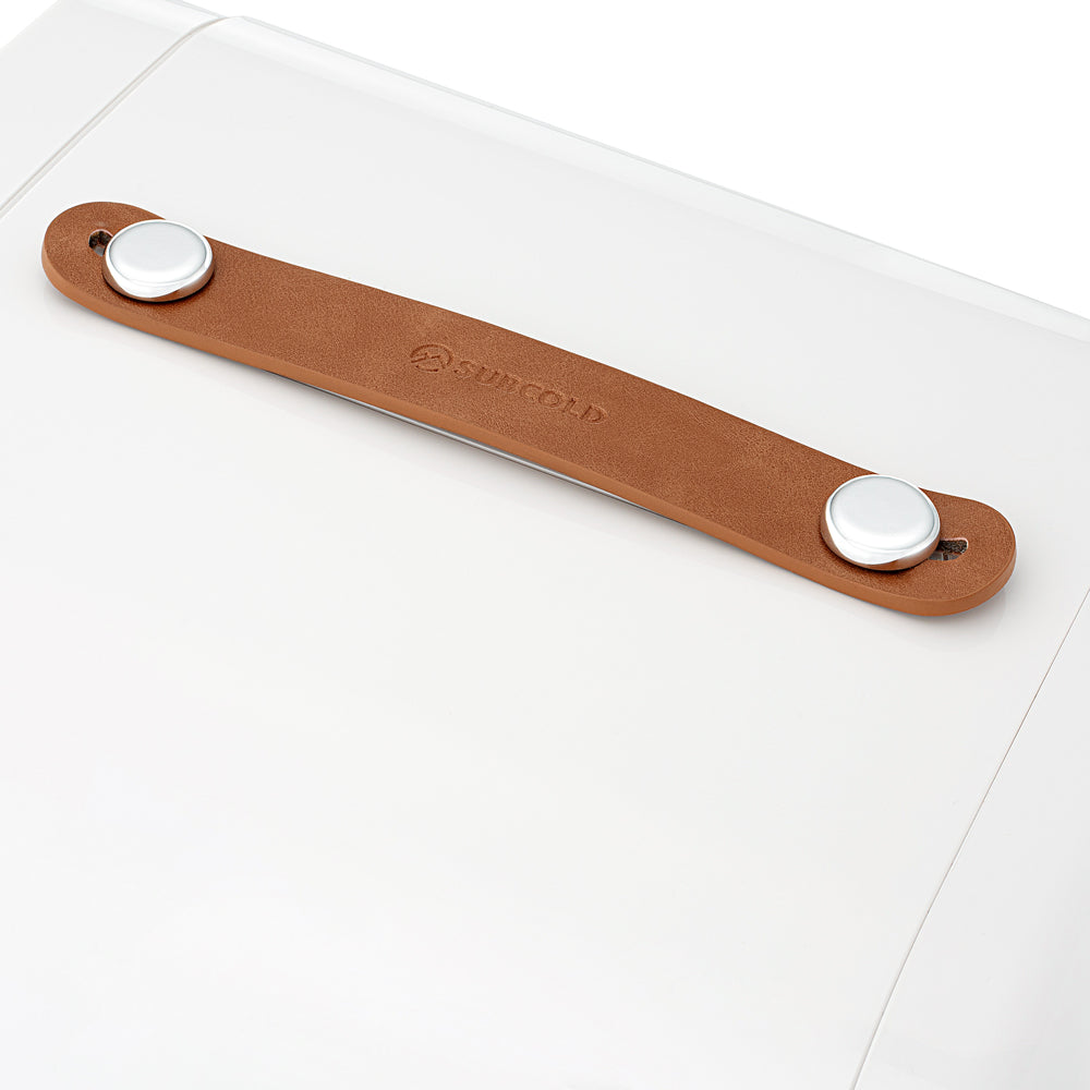 White mini fridge top strap with brown carry handle and round buttons