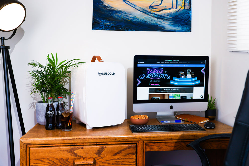 White mini fridge with Subcold branding, compact portable cooler