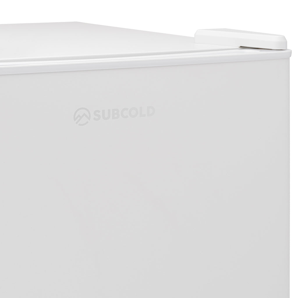White Subcold mini fridge with hinged lid and front brand logo