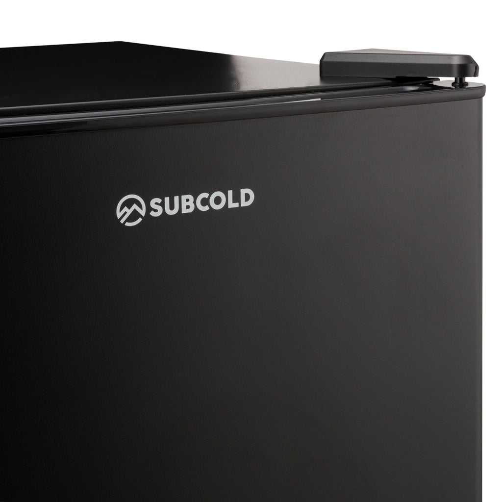 Black Subcold Aire30 LED mini fridge close-up with SUBCOLD logo and top latch