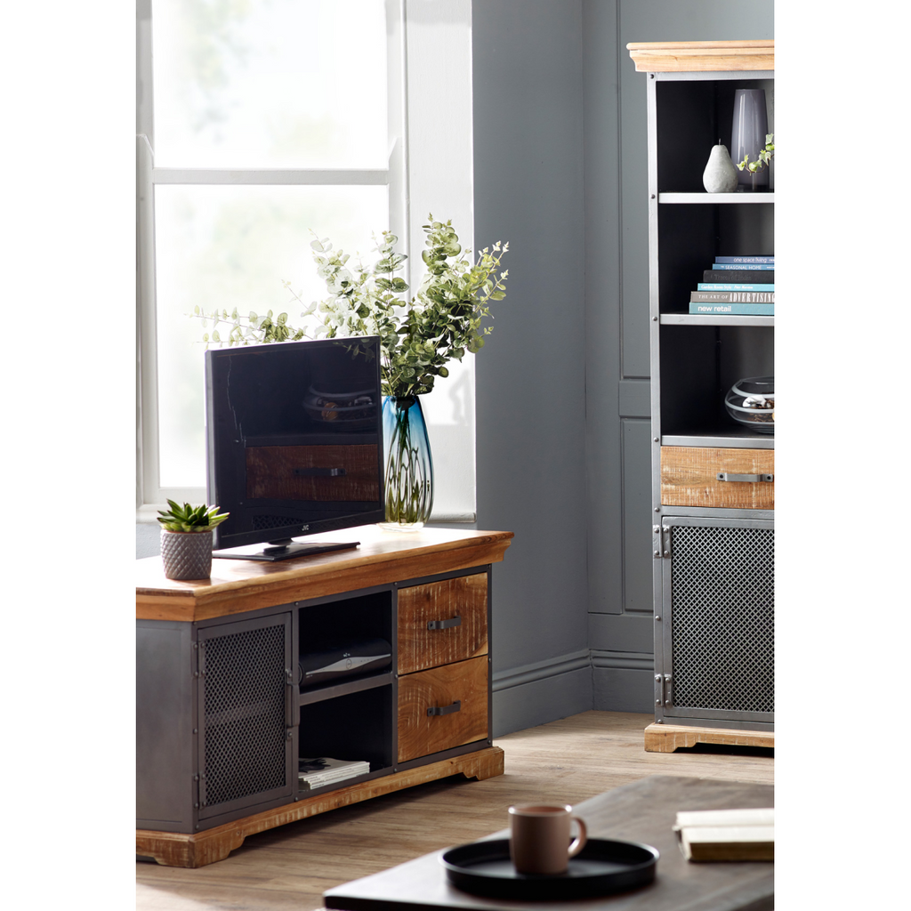 Wood and metal media console with open shelf space, drawer fronts, and mesh door.
