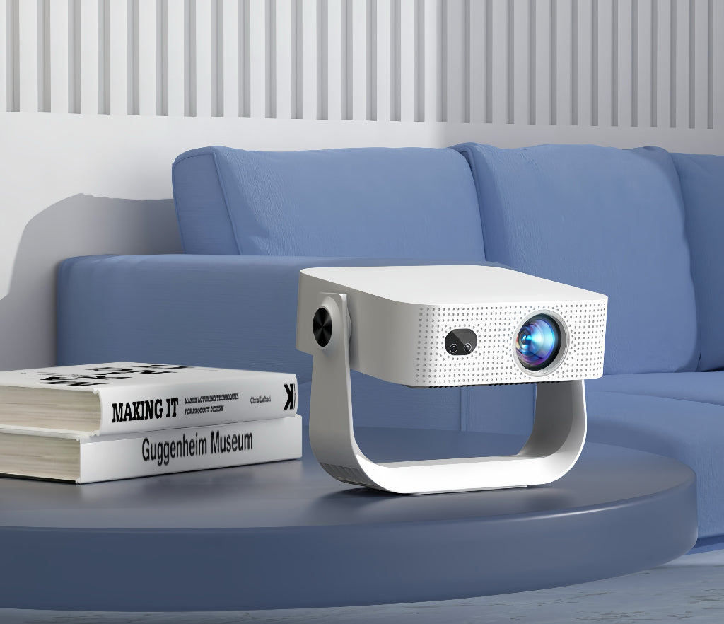 White smart projector angled on stand with front lens and speaker grille