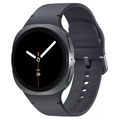 Graphite smartwatch with black round display and gray silicone band, LTE-style crown bezel.