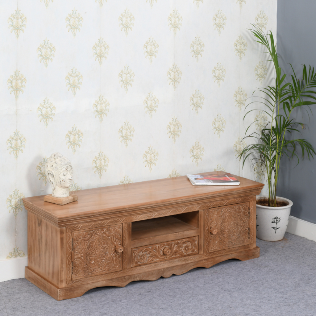 Mango wood TV cabinet with carved doors and central open media shelf, long low console.