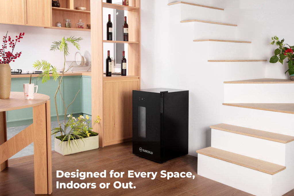 Black compact Subcold beer fridge standing upright with front control display