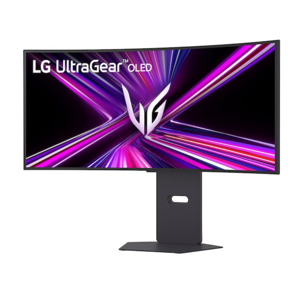 Curved gaming monitor on dark stand with bright pink and purple screen
