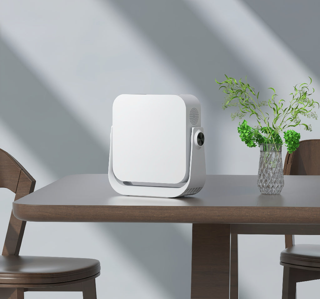 White smart projector angled left with front face cover and side speaker vent