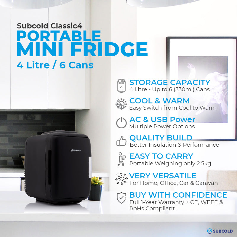 Black portable mini fridge with top carry handle, shown on a countertop