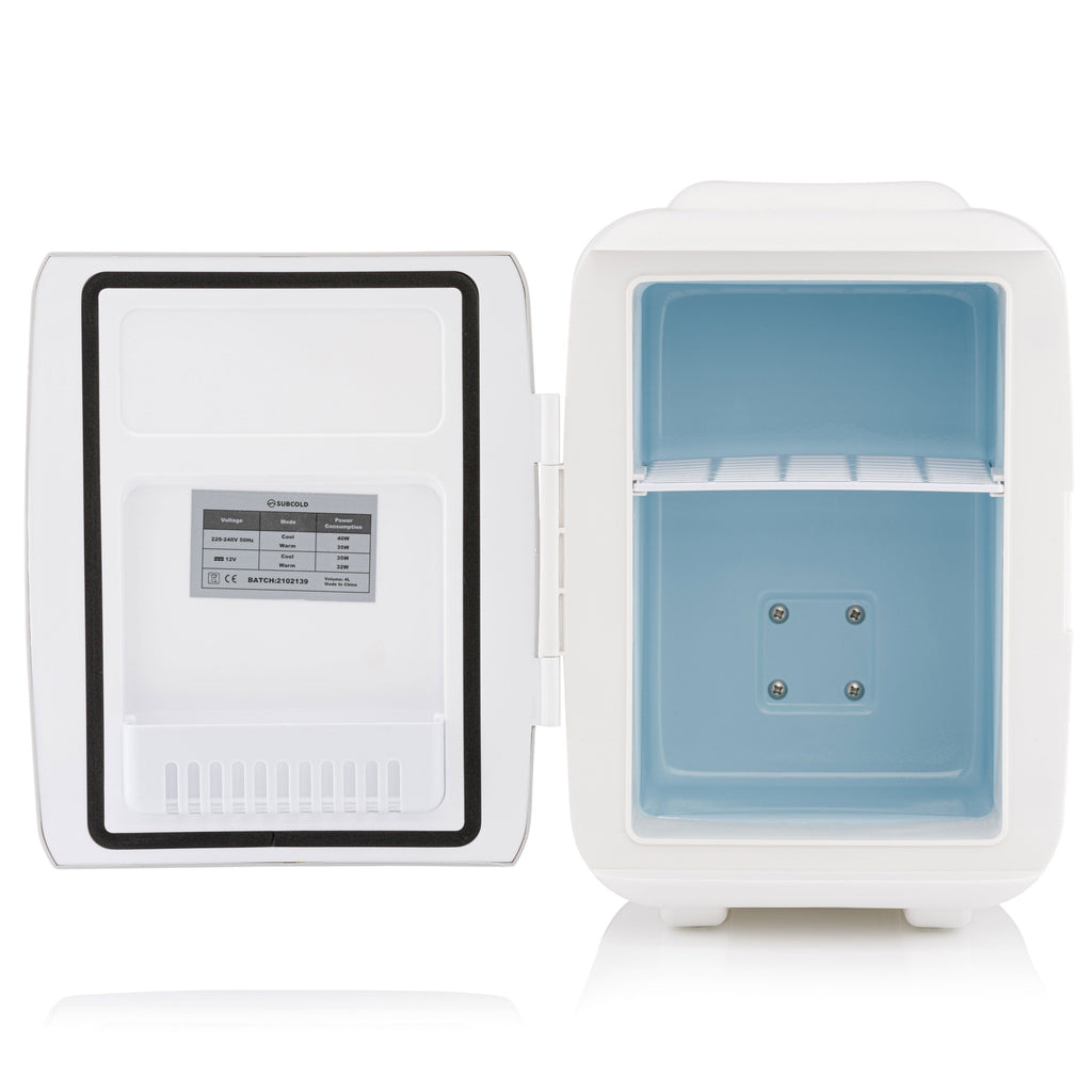 White mini fridge with door open, empty interior with blue-lined base