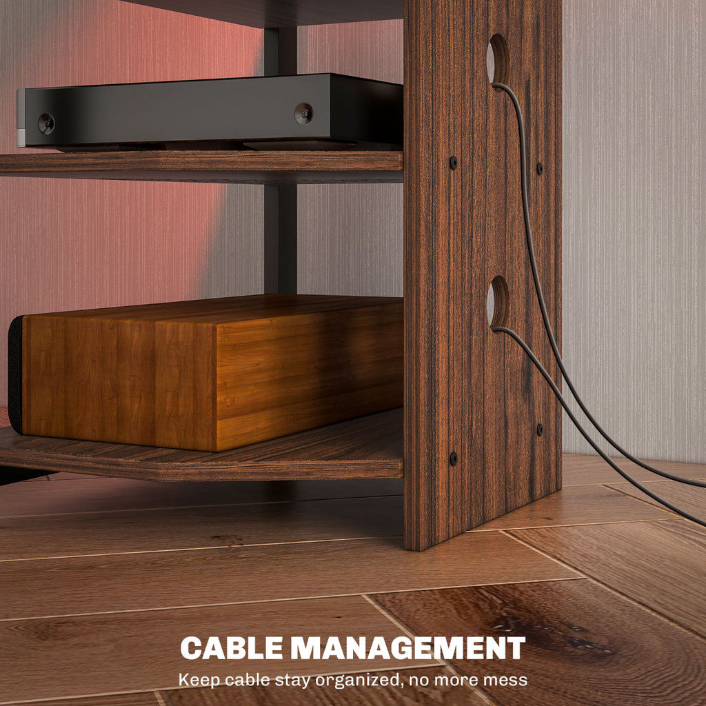 Close-up of TV stand corner: wood frame, open shelves, and routed cable openings.