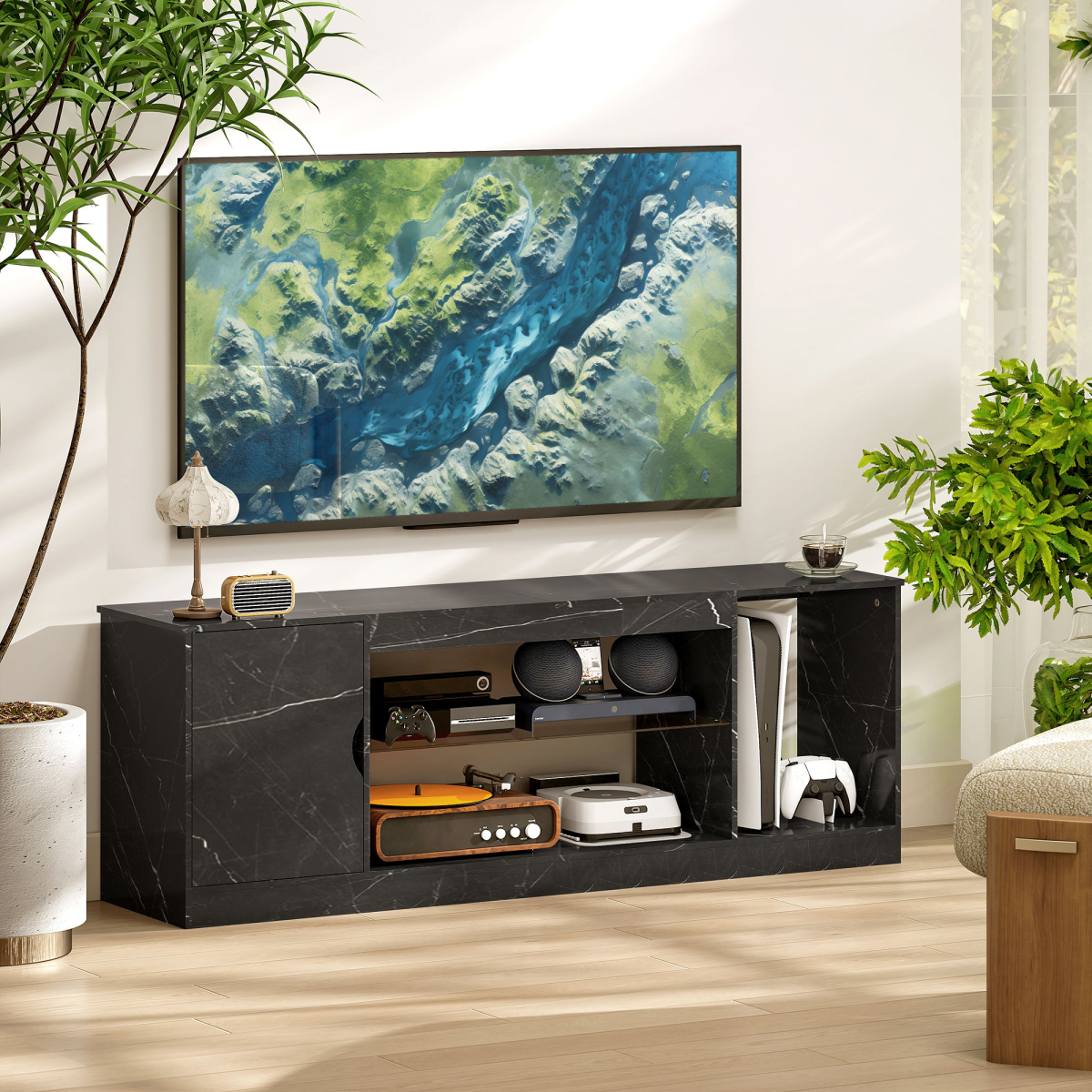 Black marble-effect TV stand with open center shelves and side storage compartments.