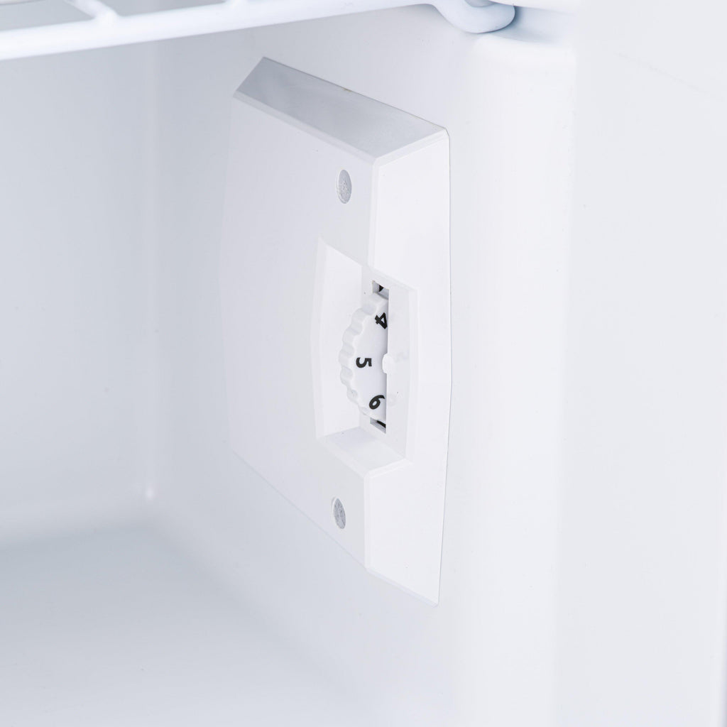 Table-top fridge interior wall outlet with two-pin power socket