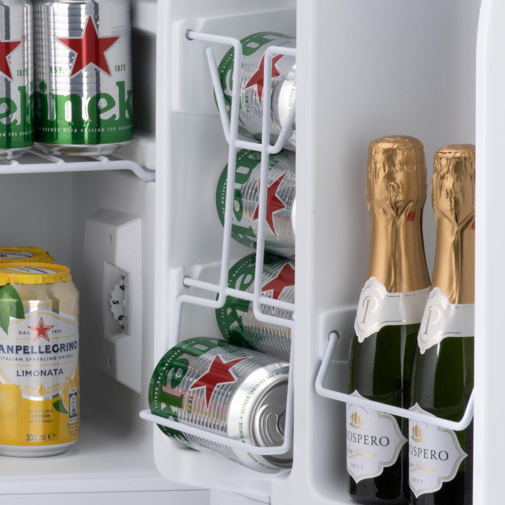 Table-top fridge interior with can racks and bottle storage on door