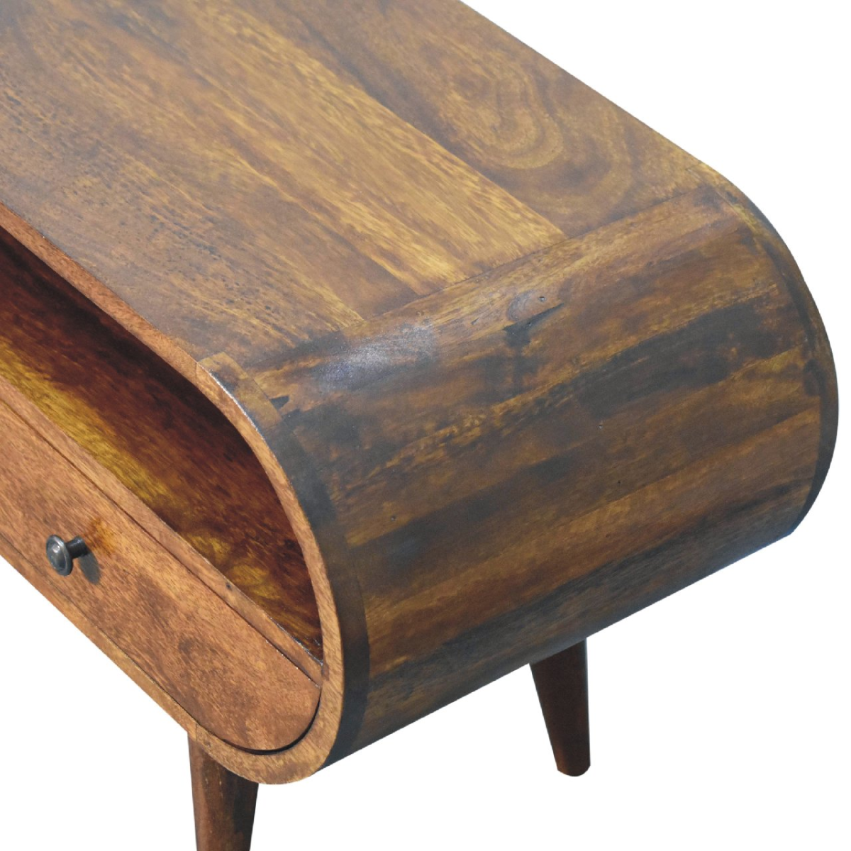 Side view detail of chestnut wood circular TV stand with carved round corner and legs