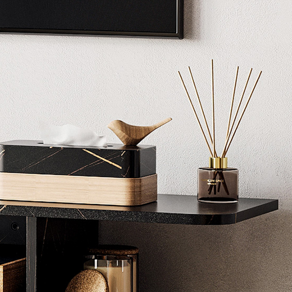 Black wall-mounted TV stand corner shelf with decorative wood box and diffuser bottle