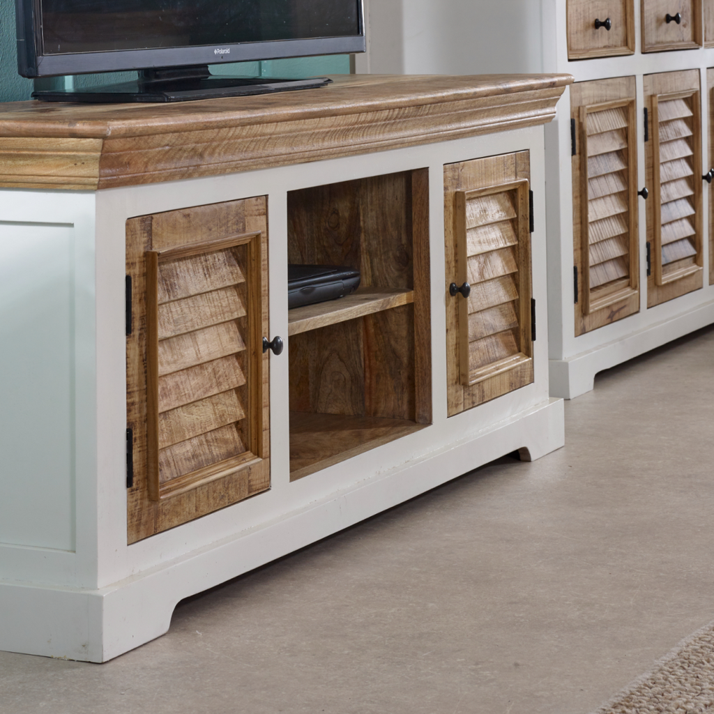 Side view of TV cabinet showing shutter-style doors, open media area, and cabling access.