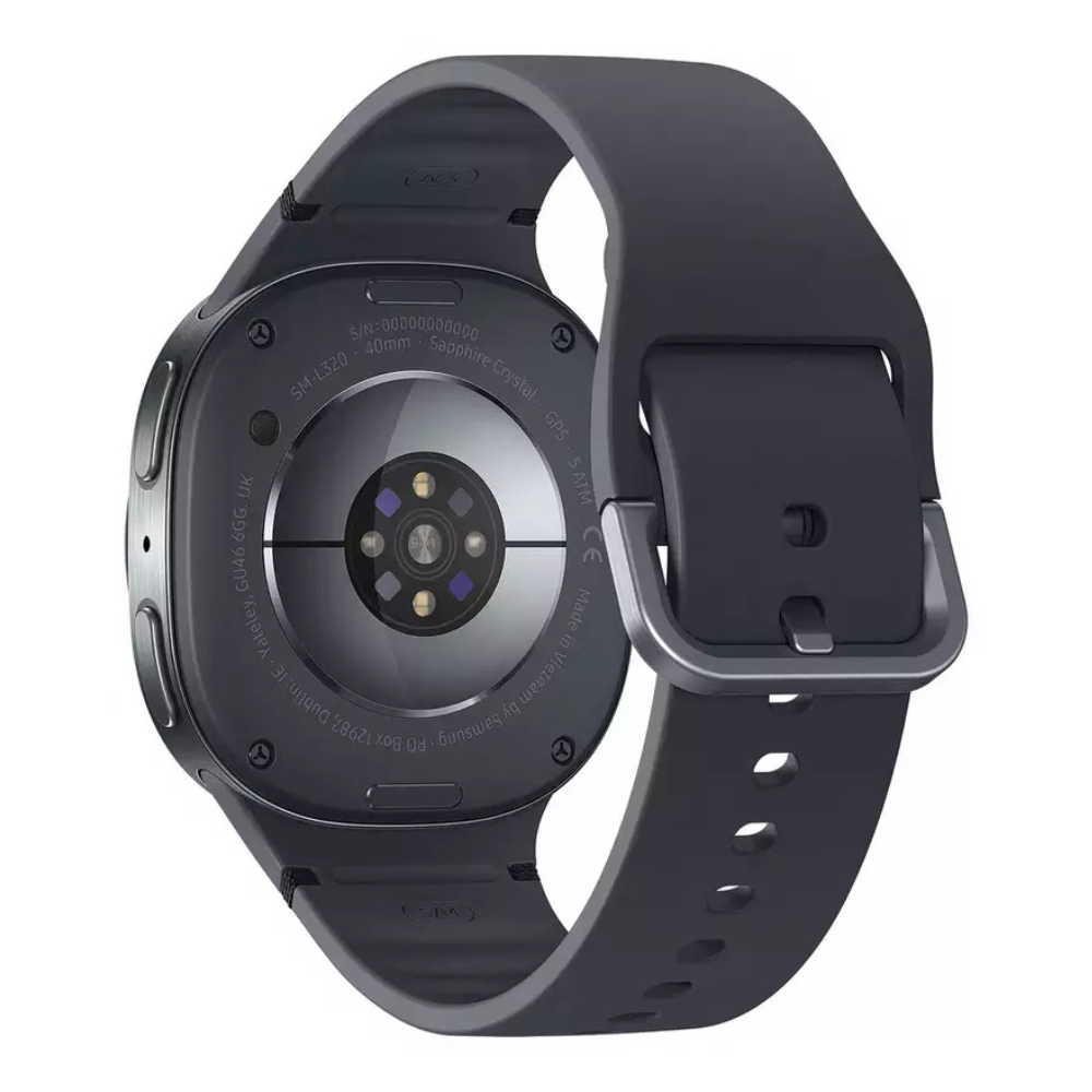 Graphite smartwatch with black underside sensors and gray silicone band, back view.