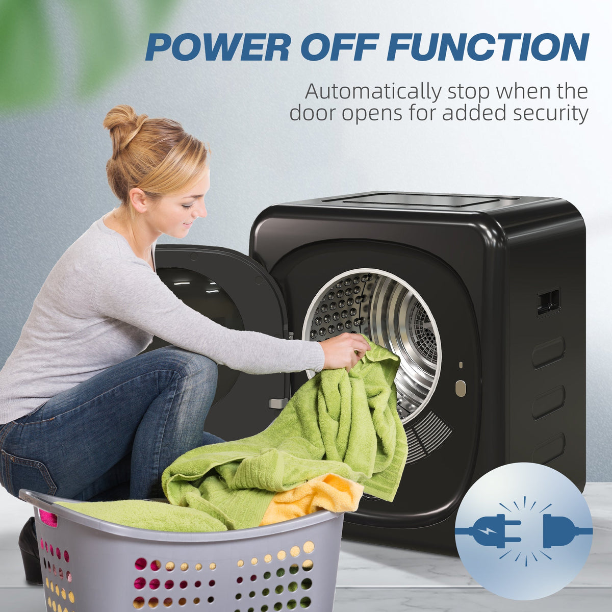 Black tumble dryer with open front door and laundry being loaded