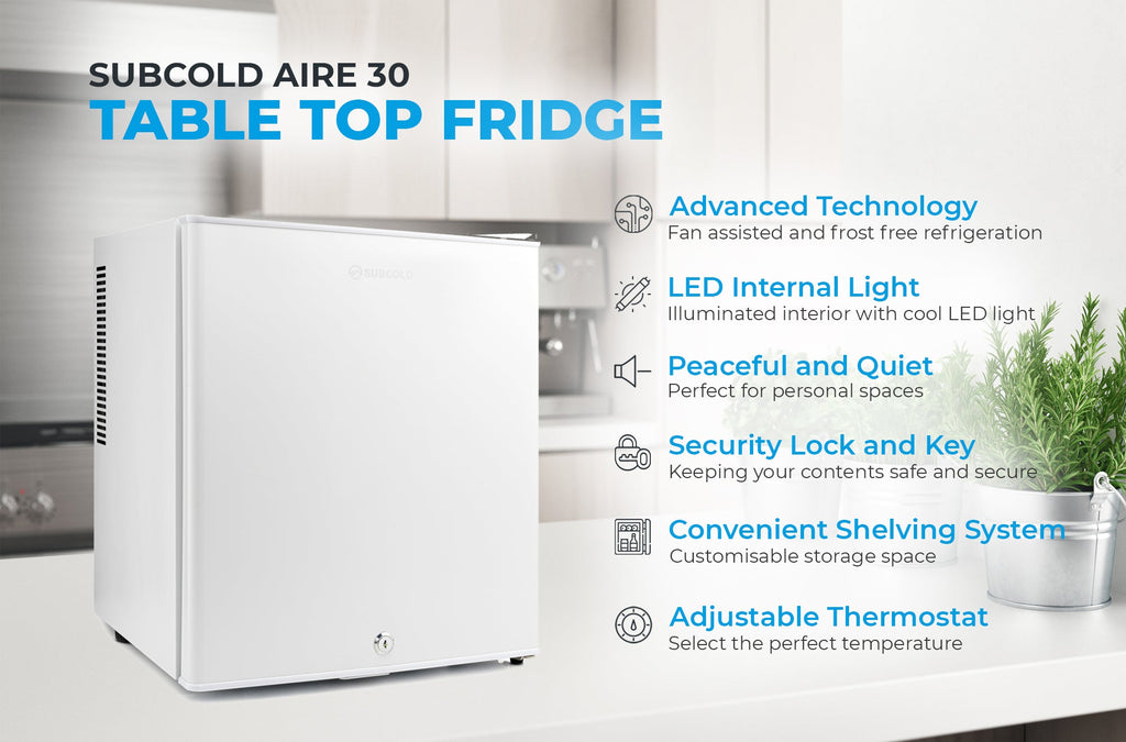 White mini fridge with door open; interior lighting and shelving details