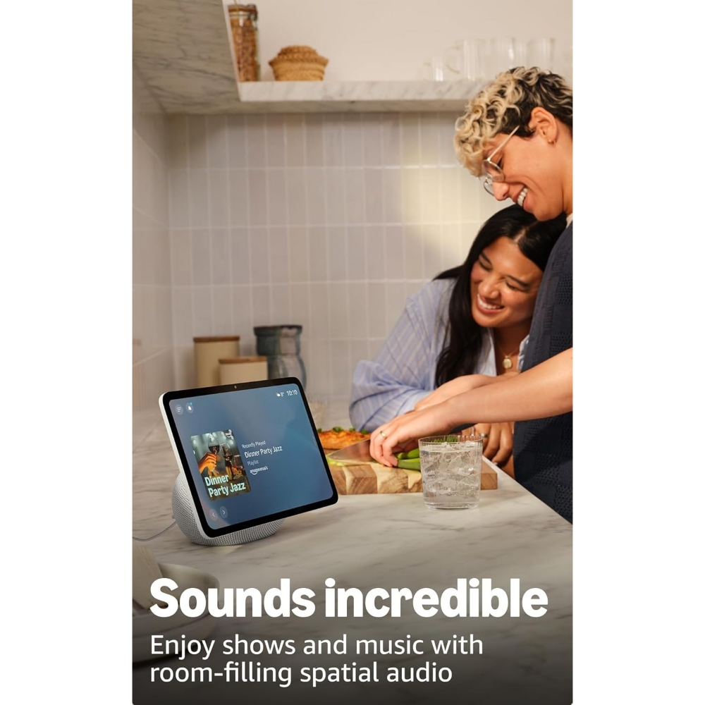 Glacier white smart display on kitchen table, showing audio playback to nearby people.