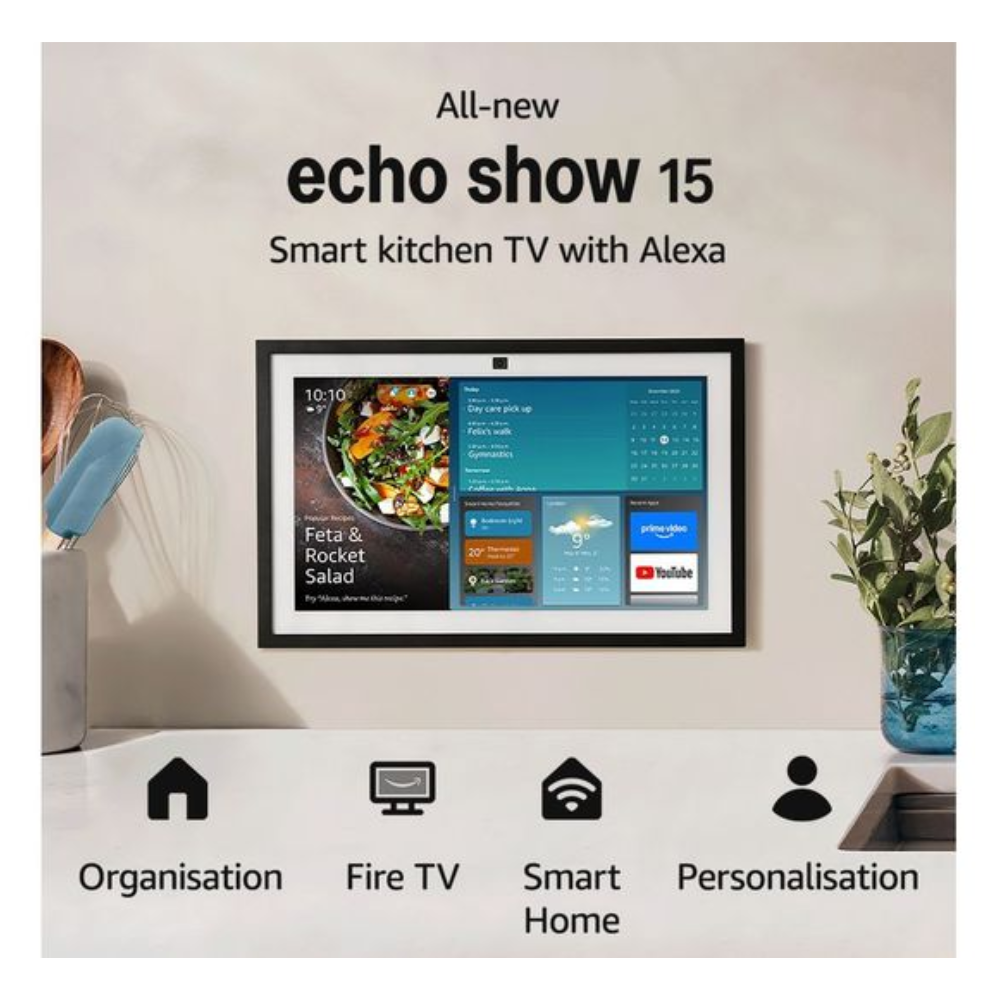 Wall-mounted smart display showing home-screen tiles with black remote nearby