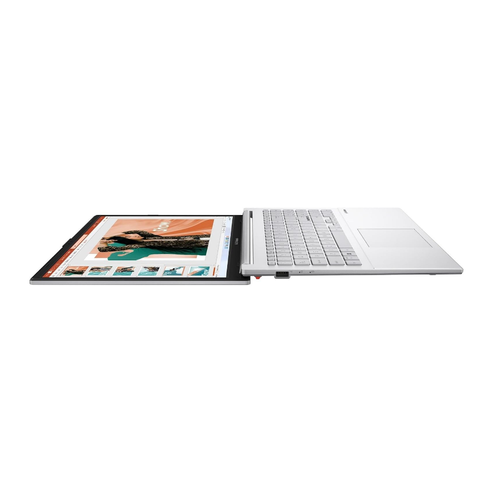 Silver ASUS laptop open from side, keyboard and display visible