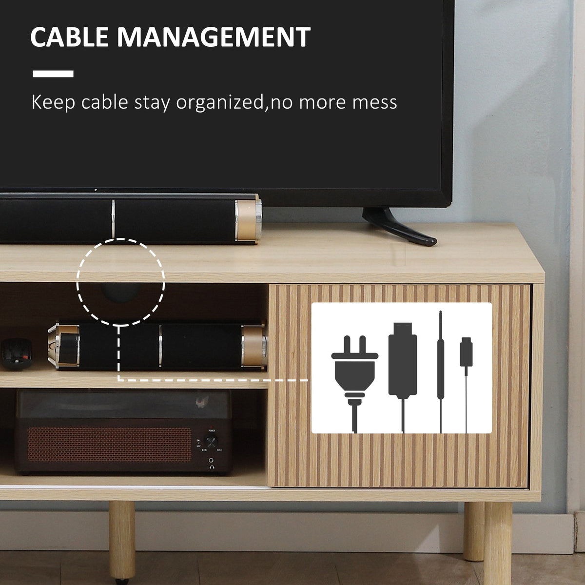 Open media shelf inside a natural wood TV stand cabinet with cable space