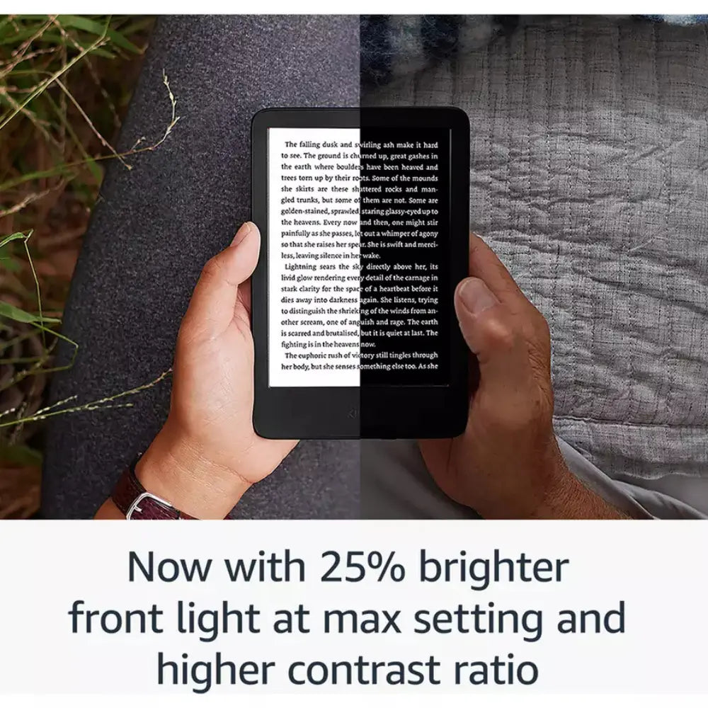 Black Kindle e-reader held in hands, single-page text displayed