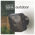 Blink outdoor 2 camera system in black, with water droplets on weatherproof housings