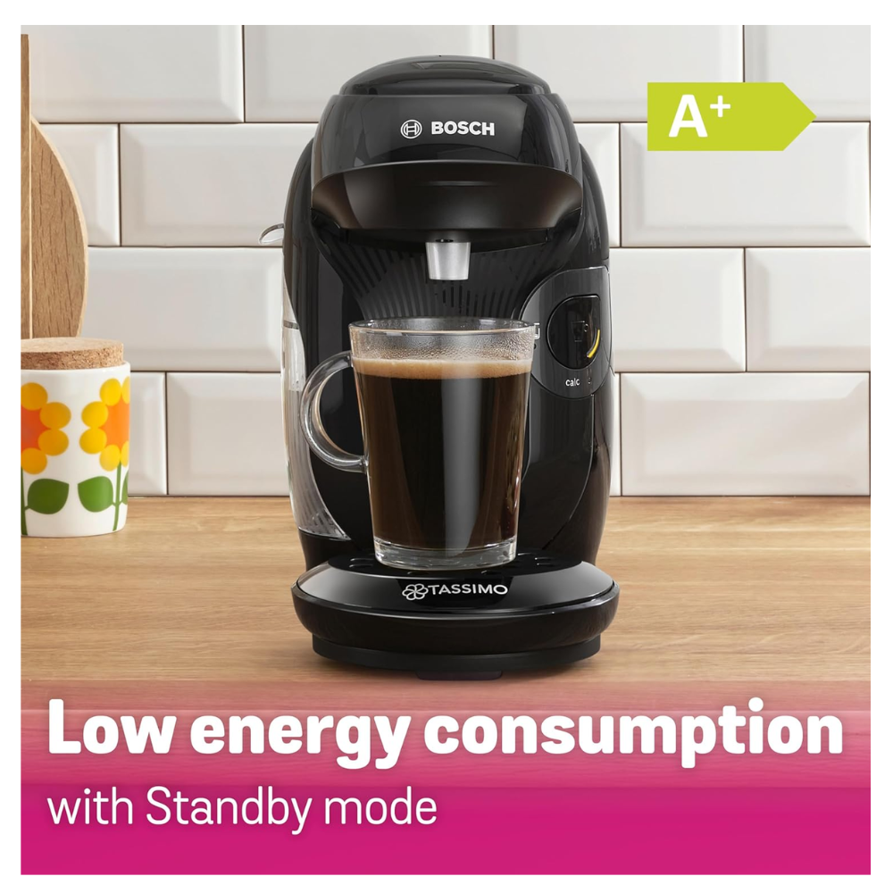 Black coffee pod machine brewing a cup on its stand
