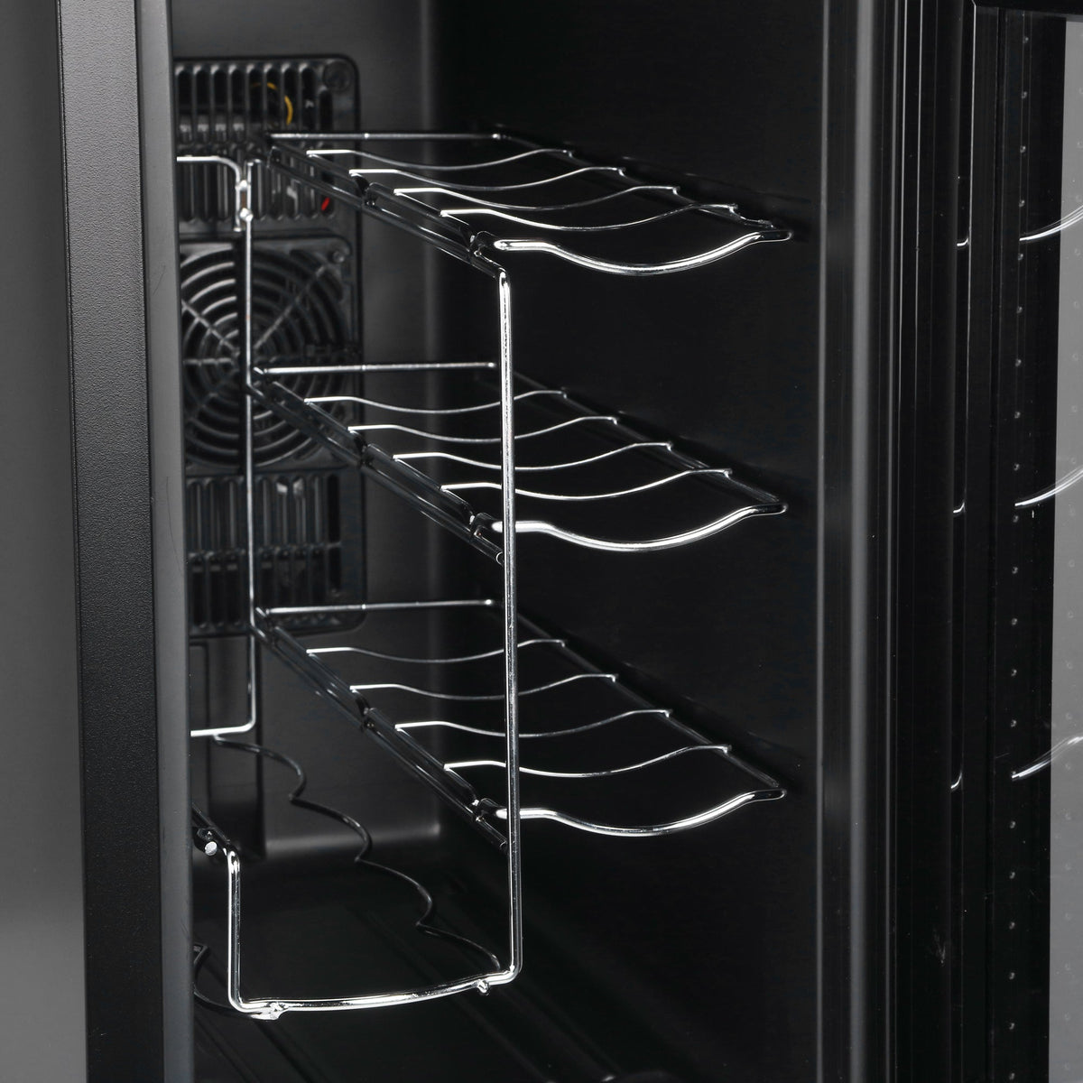 Open black wine cooler door showing three chrome wine bottle racks