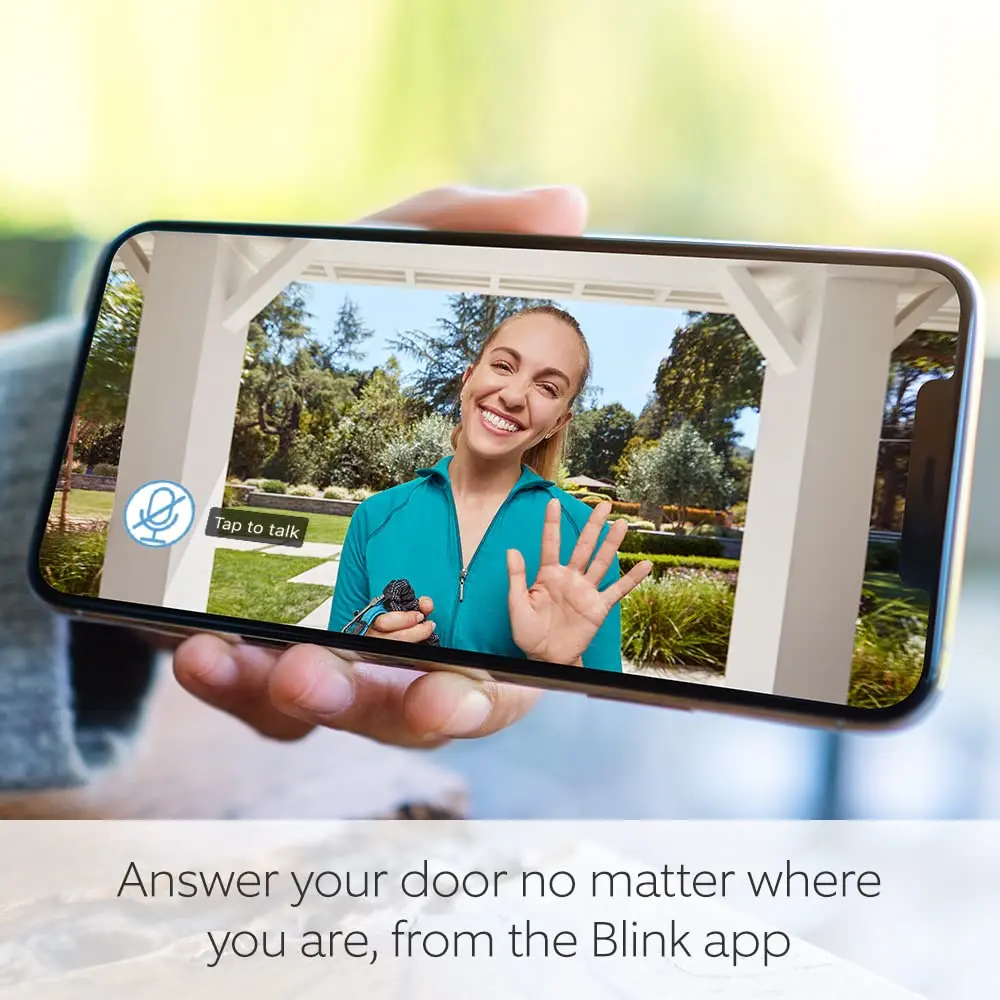 Smartphone displaying a live doorbell video feed with tap-to-talk icon