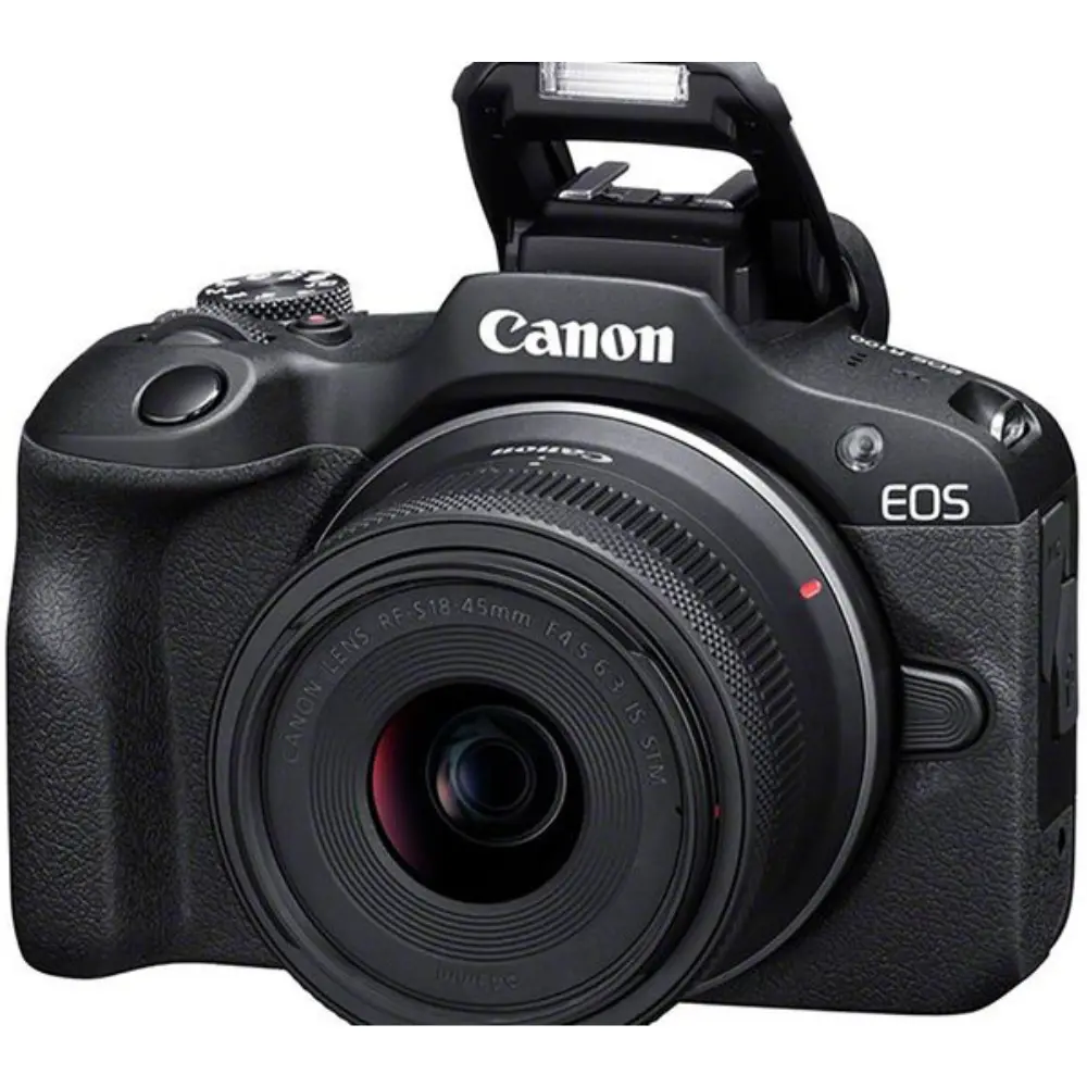Black digital camera front view with zoom lens and Canon logo on top