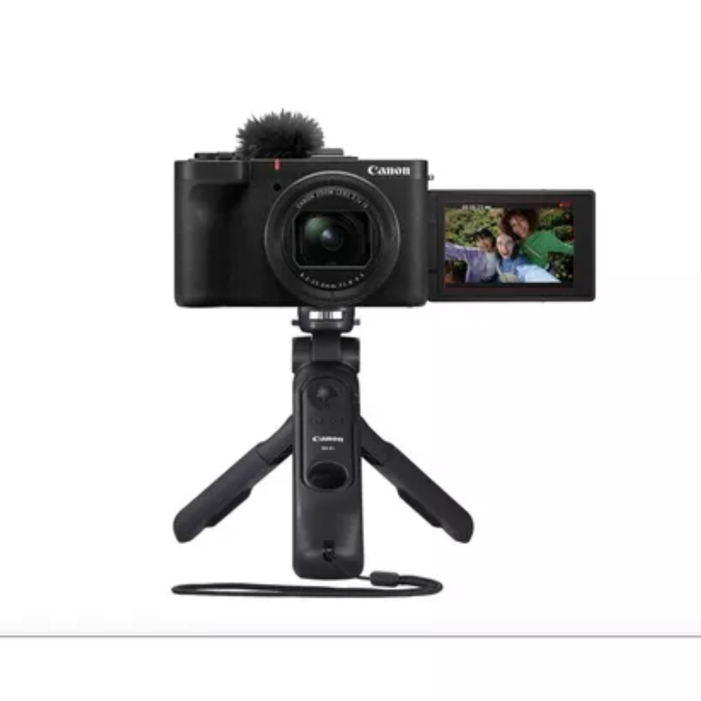 Black Canon PowerShot V1 compact camera with rear screen and small tripod stand