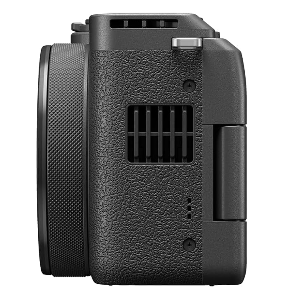 Canon PowerShot V1 vlogger camera side view with speaker grill and textured body