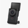 Black CANON Powershot V10 vlog camera with front lens and upright LCD screen