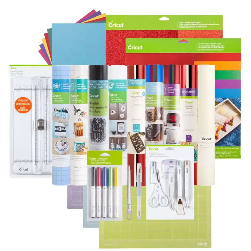 Cricut accessory set with colorful papers, cutting mats, blades, and tools