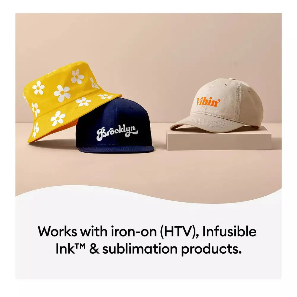 Three decorated hats on display: yellow, navy, and beige with graphic text
