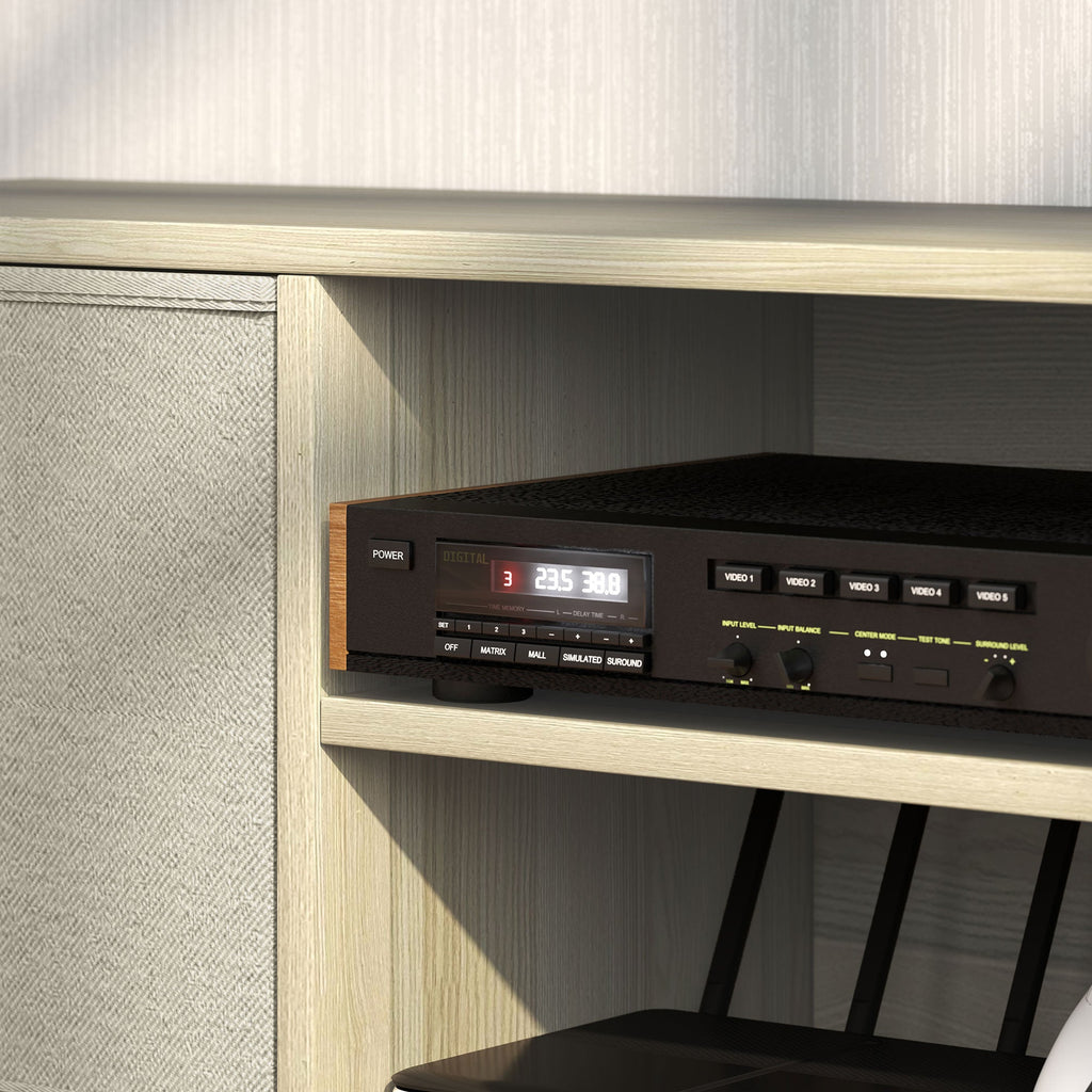 Close-up of media compartment inside TV cabinet with AV receiver on open shelf