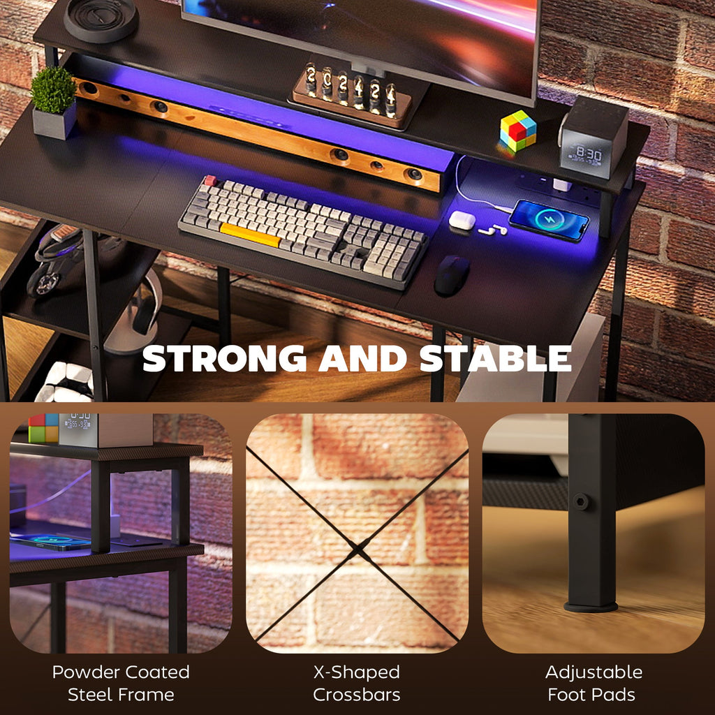 Desk surface with RGB LED strip and built-in power outlets across the top