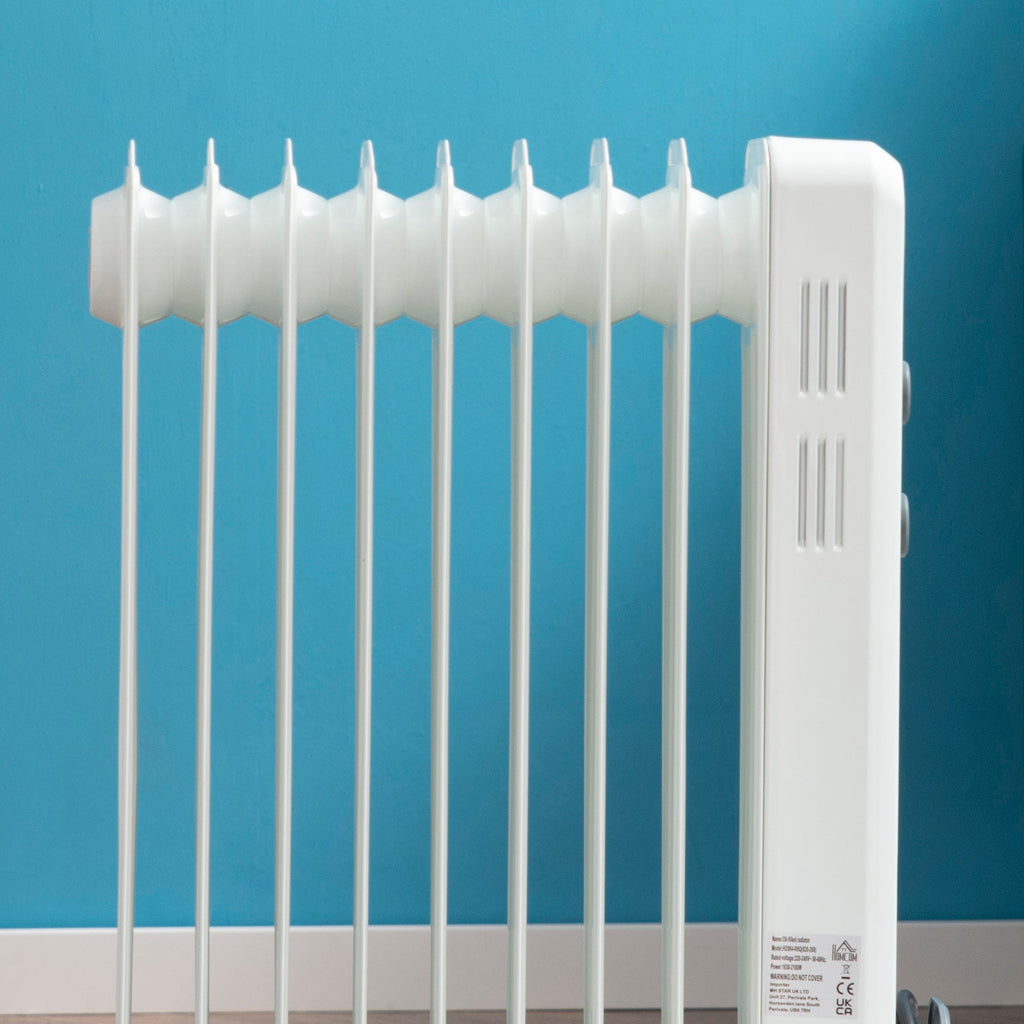 White oil-filled radiator heater with 9 fin sections and side control panel
