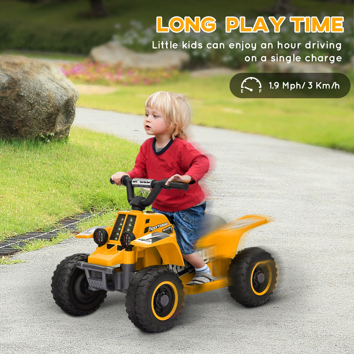 Yellow electric kids quad bike with gray seat and rugged tires, child riding outdoors.