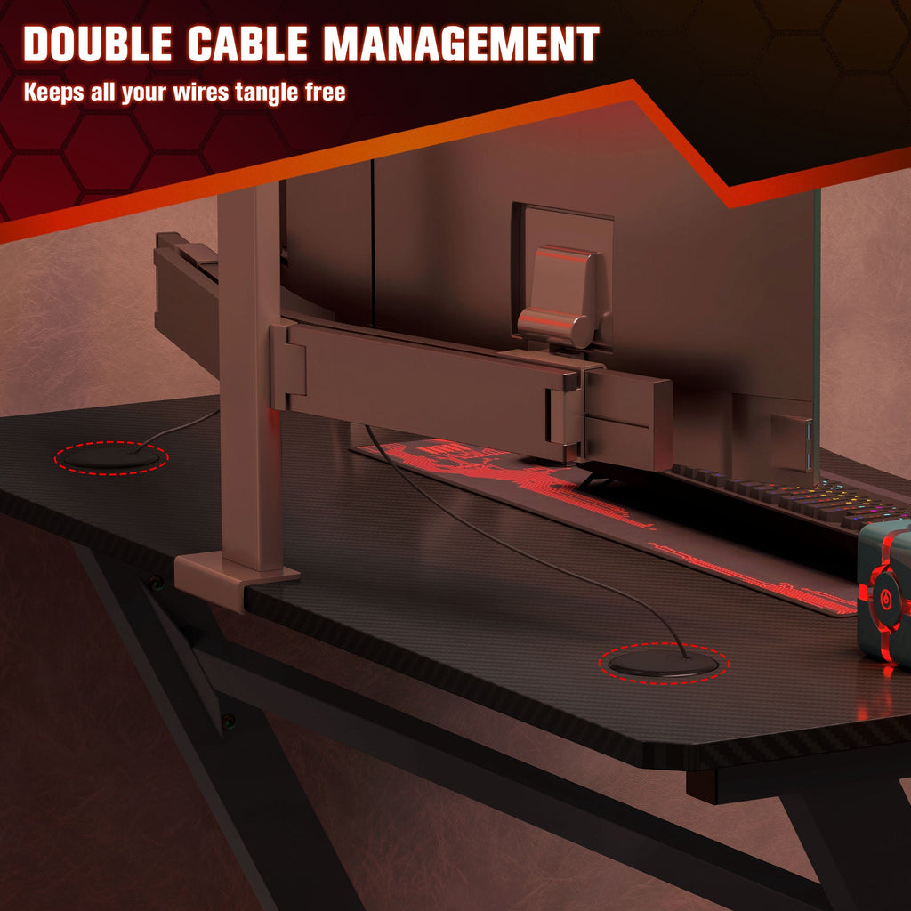Black gaming desk featuring under-desk cable management channels and organized routing