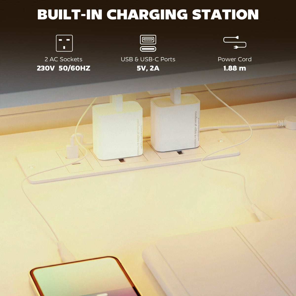 White gaming desk featuring a built-in charging station with AC outlets and USB ports