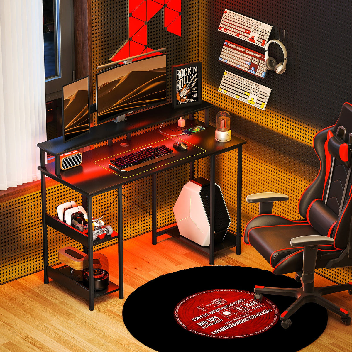 Grey computer desk with open shelves and under-desk LED light strip