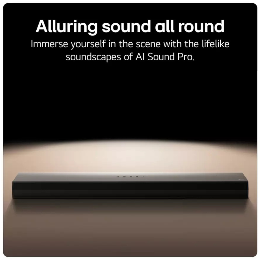 Black sound bar on a tabletop with front grille and top control strip