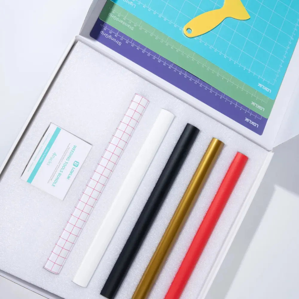 Craft starter pack tools: grid ruler and markers (black, gold, red) in tray