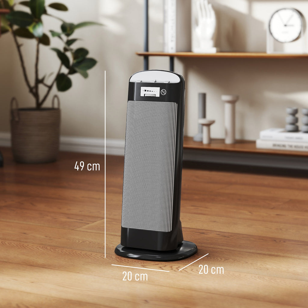 Black ceramic space heater front view on stable base with glowing heating core